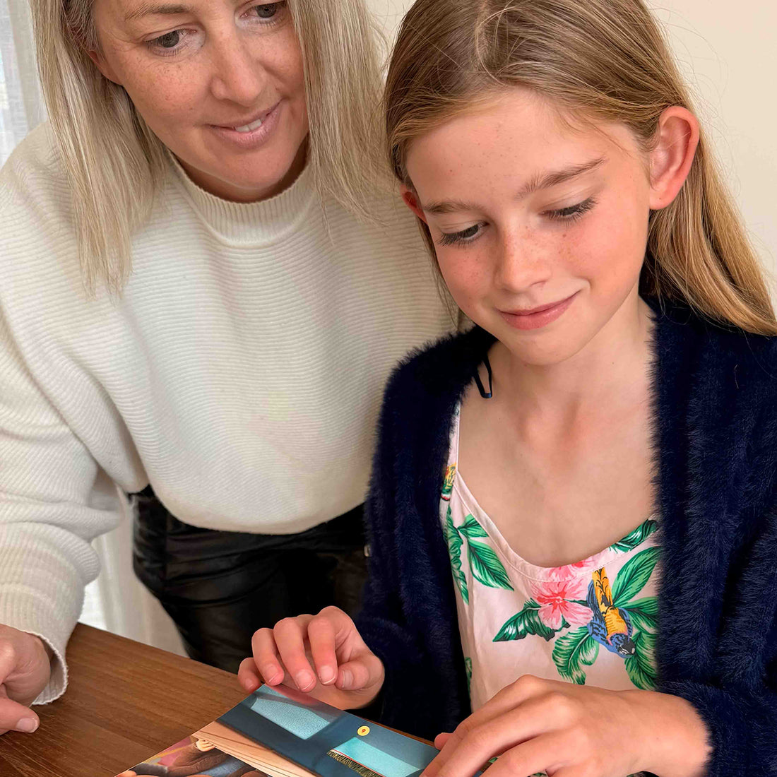 Mother and daughter reading
